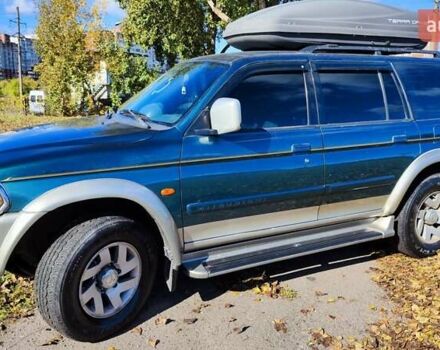 Зелений Міцубісі Паджеро Спорт, об'ємом двигуна 2.97 л та пробігом 230 тис. км за 7200 $, фото 6 на Automoto.ua