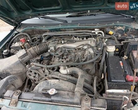 Зелений Міцубісі Паджеро Спорт, об'ємом двигуна 2.97 л та пробігом 230 тис. км за 7200 $, фото 9 на Automoto.ua