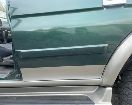 Зеленый Мицубиси Паджеро Спорт, объемом двигателя 2.5 л и пробегом 200 тыс. км за 4200 $, фото 6 на Automoto.ua