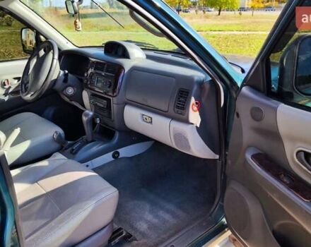 Зелений Міцубісі Паджеро Спорт, об'ємом двигуна 2.97 л та пробігом 230 тис. км за 7200 $, фото 13 на Automoto.ua