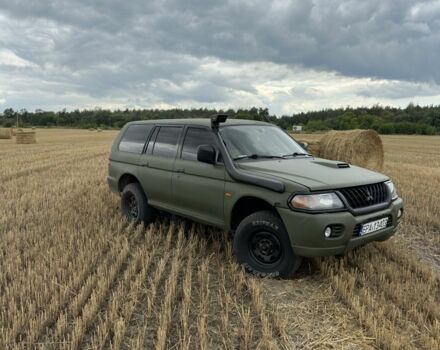 Зеленый Мицубиси Паджеро Спорт, объемом двигателя 2.5 л и пробегом 360 тыс. км за 4300 $, фото 5 на Automoto.ua