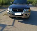 Зелений Міцубісі Паджеро Спорт, об'ємом двигуна 3 л та пробігом 160 тис. км за 8888 $, фото 1 на Automoto.ua