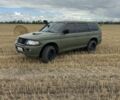 Зеленый Мицубиси Паджеро Спорт, объемом двигателя 2.5 л и пробегом 360 тыс. км за 4300 $, фото 2 на Automoto.ua