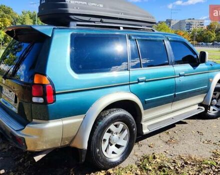 Зелений Міцубісі Паджеро Спорт, об'ємом двигуна 2.97 л та пробігом 230 тис. км за 7200 $, фото 3 на Automoto.ua