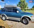 Зелений Міцубісі Паджеро Спорт, об'ємом двигуна 2.97 л та пробігом 230 тис. км за 7200 $, фото 4 на Automoto.ua