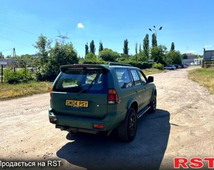 Зелений Міцубісі Паджеро Спорт, об'ємом двигуна 2.5 л та пробігом 122 тис. км за 4700 $, фото 1 на Automoto.ua