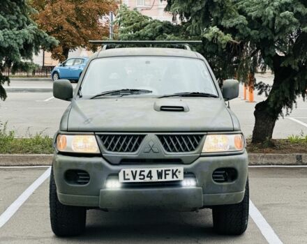 Зеленый Мицубиси Паджеро Спорт, объемом двигателя 2.5 л и пробегом 250 тыс. км за 3850 $, фото 2 на Automoto.ua