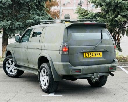 Зеленый Мицубиси Паджеро Спорт, объемом двигателя 2.5 л и пробегом 250 тыс. км за 3850 $, фото 4 на Automoto.ua