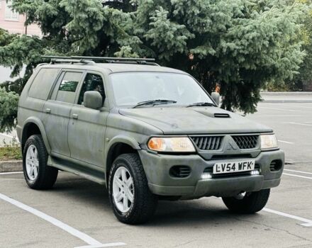Зеленый Мицубиси Паджеро Спорт, объемом двигателя 2.5 л и пробегом 250 тыс. км за 3850 $, фото 6 на Automoto.ua