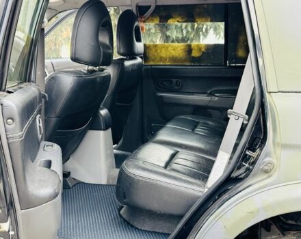 Зеленый Мицубиси Паджеро Спорт, объемом двигателя 2.5 л и пробегом 250 тыс. км за 3850 $, фото 13 на Automoto.ua