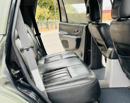 Зеленый Мицубиси Паджеро Спорт, объемом двигателя 2.5 л и пробегом 250 тыс. км за 3850 $, фото 14 на Automoto.ua