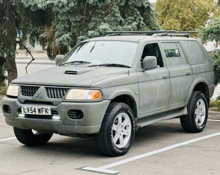 Зеленый Мицубиси Паджеро Спорт, объемом двигателя 2.5 л и пробегом 250 тыс. км за 3850 $, фото 7 на Automoto.ua