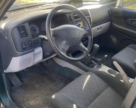 Зеленый Мицубиси Паджеро Спорт, объемом двигателя 2.5 л и пробегом 333 тыс. км за 4900 $, фото 9 на Automoto.ua