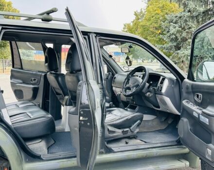 Зеленый Мицубиси Паджеро Спорт, объемом двигателя 2.5 л и пробегом 250 тыс. км за 3850 $, фото 15 на Automoto.ua