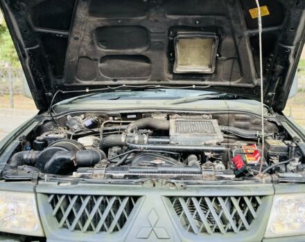 Зеленый Мицубиси Паджеро Спорт, объемом двигателя 2.5 л и пробегом 250 тыс. км за 3850 $, фото 18 на Automoto.ua