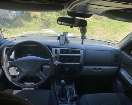 Зелений Міцубісі Паджеро Спорт, об'ємом двигуна 2.5 л та пробігом 280 тис. км за 5809 $, фото 7 на Automoto.ua