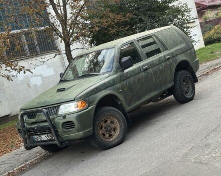 Зеленый Мицубиси Паджеро Спорт, объемом двигателя 2.5 л и пробегом 300 тыс. км за 4999 $, фото 1 на Automoto.ua