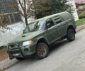 Зеленый Мицубиси Паджеро Спорт, объемом двигателя 2.5 л и пробегом 300 тыс. км за 4999 $, фото 1 на Automoto.ua