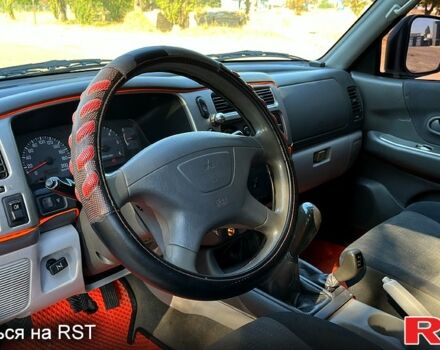 Зеленый Мицубиси Паджеро Спорт, объемом двигателя 2.5 л и пробегом 273 тыс. км за 4900 $, фото 6 на Automoto.ua