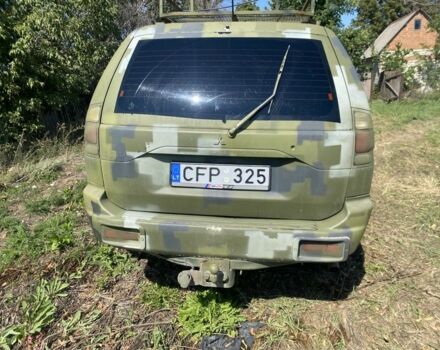 Зелений Міцубісі Паджеро Спорт, об'ємом двигуна 2.5 л та пробігом 280 тис. км за 4950 $, фото 5 на Automoto.ua