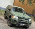 Зеленый Мицубиси Паджеро Спорт, объемом двигателя 2.5 л и пробегом 300 тыс. км за 4999 $, фото 1 на Automoto.ua