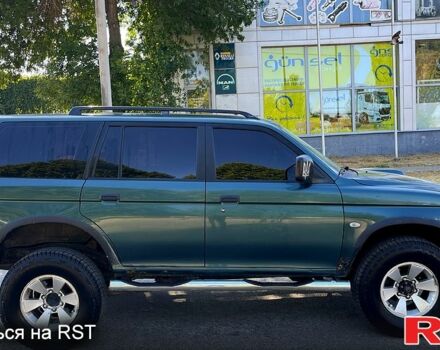Зеленый Мицубиси Паджеро Спорт, объемом двигателя 2.5 л и пробегом 273 тыс. км за 4900 $, фото 2 на Automoto.ua