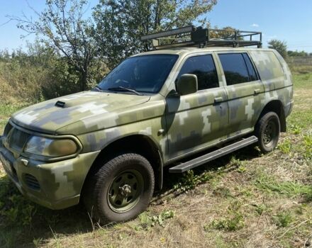 Зелений Міцубісі Паджеро Спорт, об'ємом двигуна 2.5 л та пробігом 280 тис. км за 5809 $, фото 1 на Automoto.ua