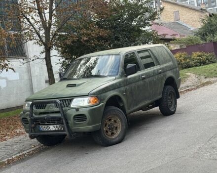 Зеленый Мицубиси Паджеро Спорт, объемом двигателя 2.5 л и пробегом 300 тыс. км за 4999 $, фото 3 на Automoto.ua