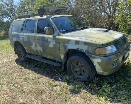 Зелений Міцубісі Паджеро Спорт, об'ємом двигуна 2.5 л та пробігом 280 тис. км за 5809 $, фото 2 на Automoto.ua