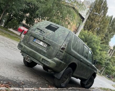 Зеленый Мицубиси Паджеро Спорт, объемом двигателя 2.5 л и пробегом 300 тыс. км за 4999 $, фото 5 на Automoto.ua