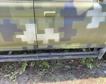 Зелений Міцубісі Паджеро Спорт, об'ємом двигуна 2.5 л та пробігом 280 тис. км за 5809 $, фото 6 на Automoto.ua