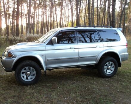 Зеленый Мицубиси Паджеро Спорт, объемом двигателя 2.5 л и пробегом 250 тыс. км за 9500 $, фото 1 на Automoto.ua