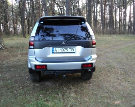 Зеленый Мицубиси Паджеро Спорт, объемом двигателя 2.5 л и пробегом 250 тыс. км за 9500 $, фото 2 на Automoto.ua