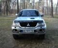 Зеленый Мицубиси Паджеро Спорт, объемом двигателя 2.5 л и пробегом 250 тыс. км за 9500 $, фото 1 на Automoto.ua