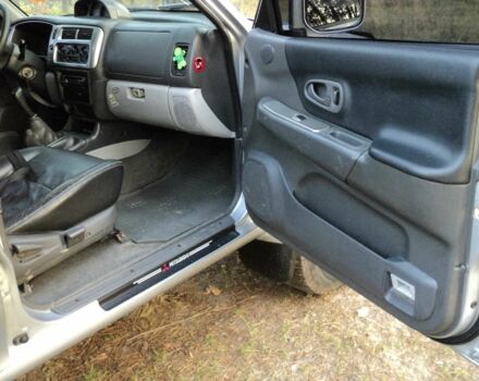 Зеленый Мицубиси Паджеро Спорт, объемом двигателя 2.5 л и пробегом 250 тыс. км за 9500 $, фото 6 на Automoto.ua