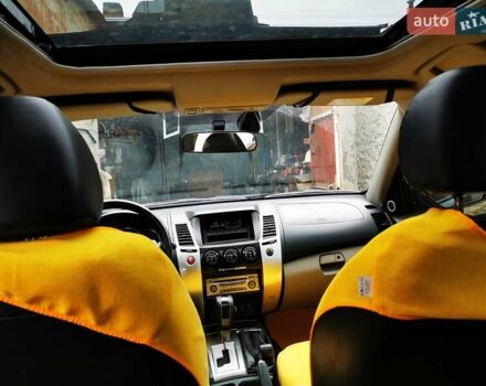 Зелений Міцубісі Паджеро Спорт, об'ємом двигуна 3 л та пробігом 107 тис. км за 14500 $, фото 6 на Automoto.ua