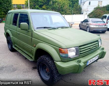 Зеленый Мицубиси Паджеро Спорт, объемом двигателя 2.9 л и пробегом 300 тыс. км за 2399 $, фото 1 на Automoto.ua