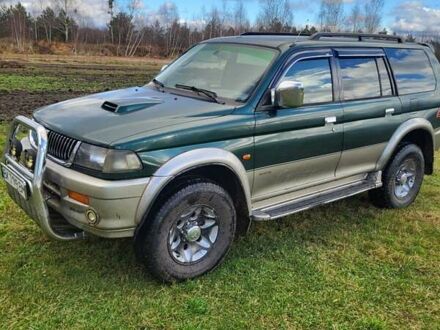 Зеленый Мицубиси Паджеро Спорт, объемом двигателя 2.5 л и пробегом 200 тыс. км за 6200 $, фото 1 на Automoto.ua
