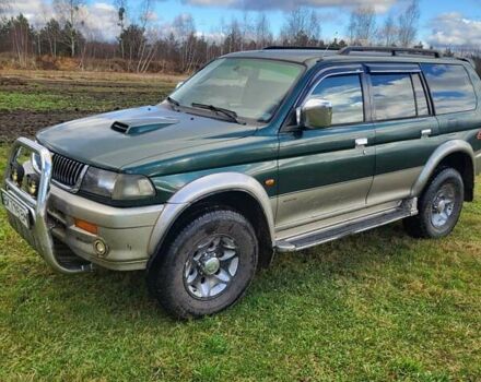 Зеленый Мицубиси Паджеро Спорт, объемом двигателя 2.5 л и пробегом 200 тыс. км за 6200 $, фото 1 на Automoto.ua