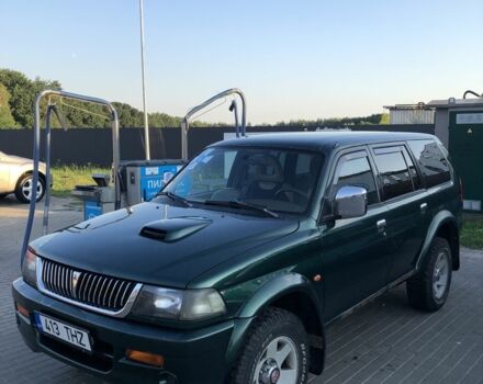 Зеленый Мицубиси Паджеро Спорт, объемом двигателя 2.5 л и пробегом 338 тыс. км за 2600 $, фото 1 на Automoto.ua