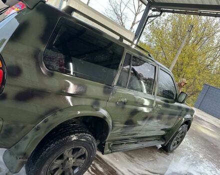 Зелений Міцубісі Паджеро Спорт, об'ємом двигуна 3 л та пробігом 300 тис. км за 2600 $, фото 1 на Automoto.ua