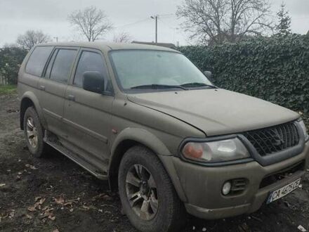 Зеленый Мицубиси Паджеро Спорт, объемом двигателя 2.97 л и пробегом 250 тыс. км за 4500 $, фото 1 на Automoto.ua