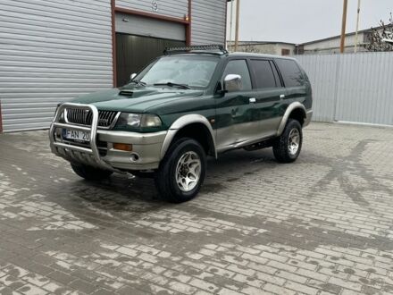 Зеленый Мицубиси Паджеро Спорт, объемом двигателя 2.5 л и пробегом 111 тыс. км за 3000 $, фото 1 на Automoto.ua