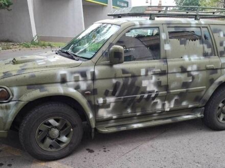 Зелений Міцубісі Паджеро Спорт, об'ємом двигуна 2.5 л та пробігом 250 тис. км за 5003 $, фото 1 на Automoto.ua