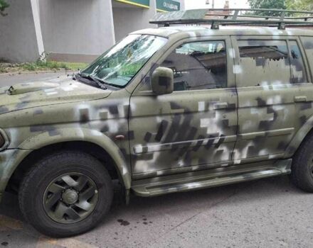 Зеленый Мицубиси Паджеро Спорт, объемом двигателя 2.5 л и пробегом 250 тыс. км за 5003 $, фото 1 на Automoto.ua