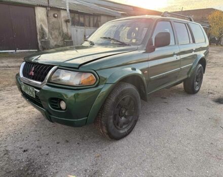 Зеленый Мицубиси Паджеро Спорт, объемом двигателя 3 л и пробегом 289 тыс. км за 2800 $, фото 1 на Automoto.ua