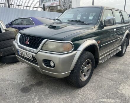 Зеленый Мицубиси Паджеро Спорт, объемом двигателя 2.5 л и пробегом 200 тыс. км за 4200 $, фото 1 на Automoto.ua