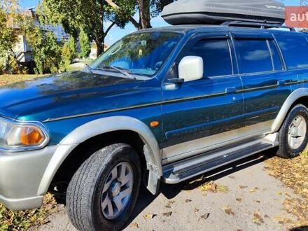 Зелений Міцубісі Паджеро Спорт, об'ємом двигуна 2.97 л та пробігом 230 тис. км за 7200 $, фото 1 на Automoto.ua