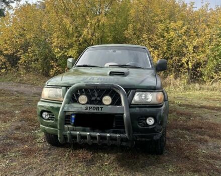 Зелений Міцубісі Паджеро Спорт, об'ємом двигуна 2.5 л та пробігом 300 тис. км за 7300 $, фото 1 на Automoto.ua