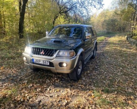 Зеленый Мицубиси Паджеро Спорт, объемом двигателя 2.5 л и пробегом 333 тыс. км за 4900 $, фото 1 на Automoto.ua